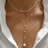 Collana a Due Giri con Perle e Pendenti