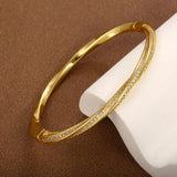 Elegante bracciale in cristallo con due file in oro