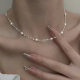Collana elegante con perle brillanti