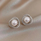 Orecchini Spiralati Brillanti con Eleganti Perle