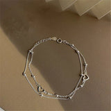 Bracciale regolabile con cuore d'argento