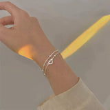 Bracciale regolabile con cuore d'argento