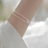 Bracciale regolabile con cuore d'argento