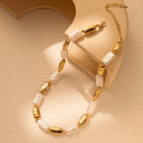Collana vintage con perle dorate e bianche rettangolari